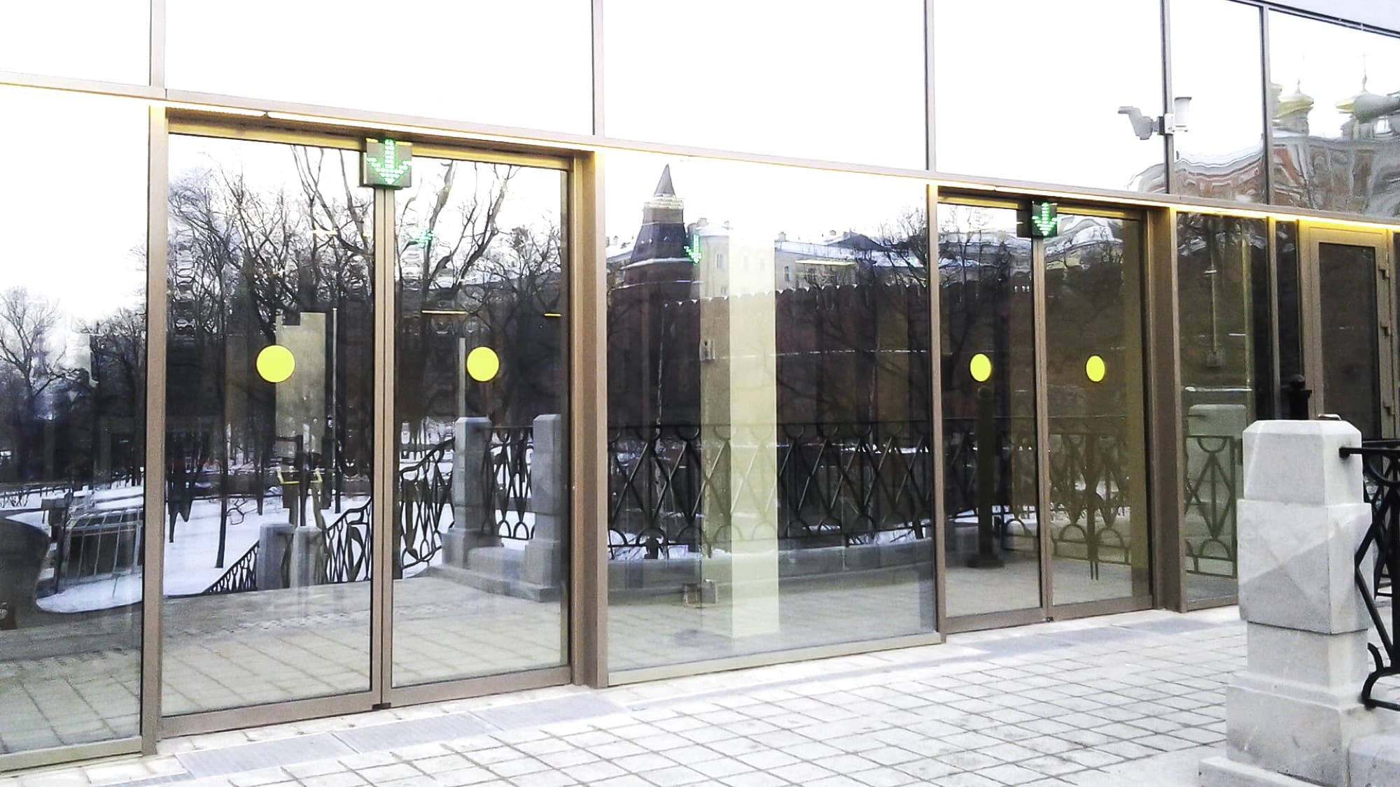Automatic sliding glass doors forming the entrance to a commercial building