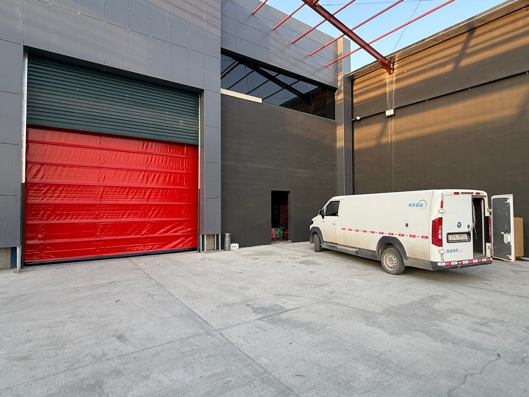 PVC high-speed roll-up door in the opening of an industrial building